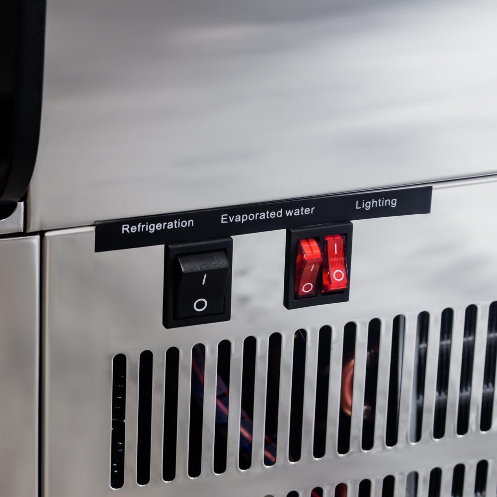 Close-up view of the control switches to AG Equipment's open-air display grab-and-go fridge.
