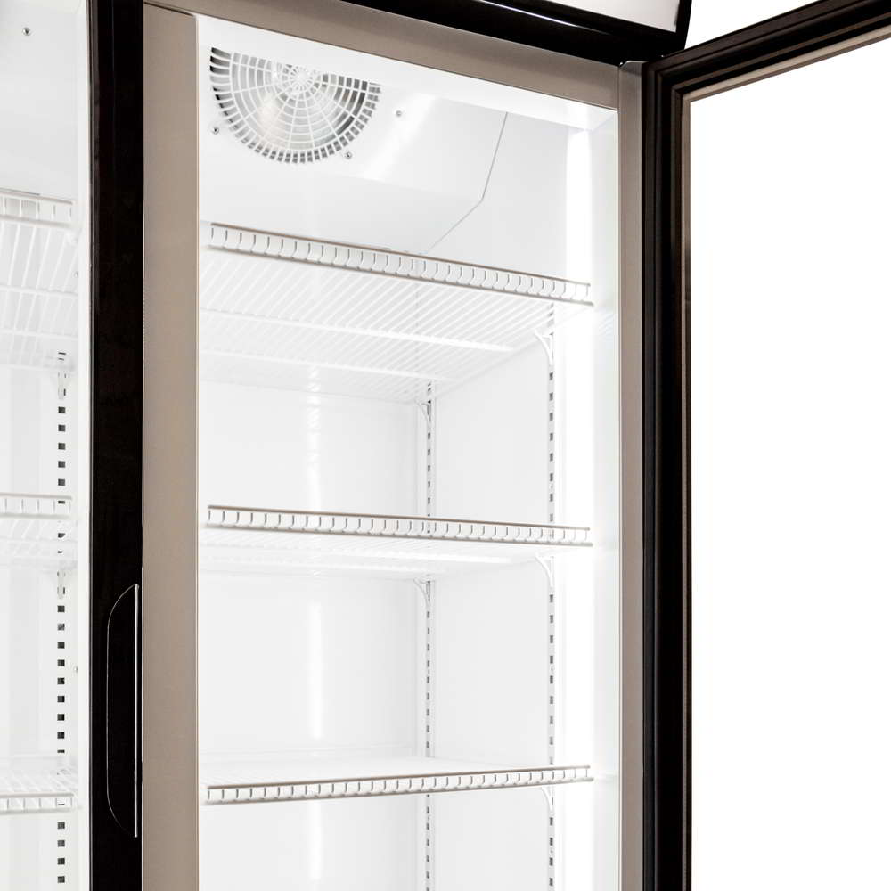 Close-up view of a restaurant display refrigerator. It shows within the unit, the extraction fan, shelves and anchoring rails